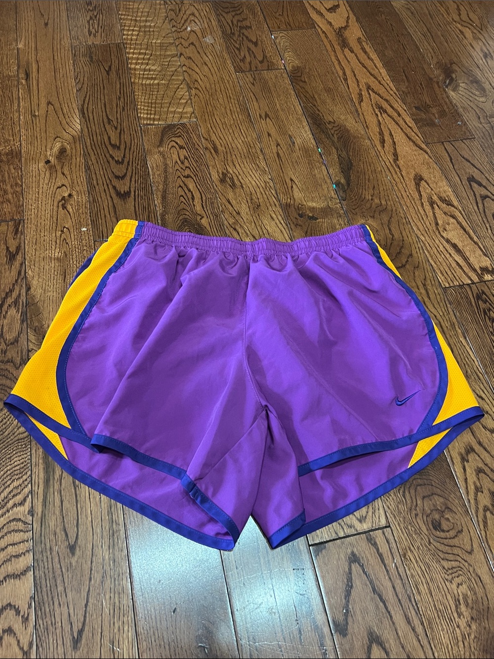 Nike Purple Athletic Shorts with Yellow Accents